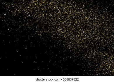 Gold glitter texture isolated on black. Amber particles color. Celebratory background. Golden explosion of confetti. Vector illustration,eps 10.