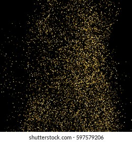 Gold glitter texture isolated on black. Amber particles color. Celebratory background. Golden explosion of confetti. 