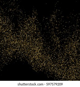 Gold glitter texture isolated on black. Amber particles color. Celebratory background. Golden explosion of confetti. 
