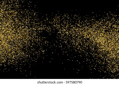 Gold glitter texture isolated on black. Amber particles color. Celebratory background. Golden explosion of confetti. 