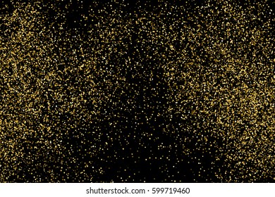 Gold glitter texture isolated on black. Amber particles color. Celebratory background. Golden explosion of confetti 
