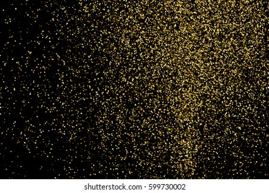 Gold glitter texture isolated on black. Amber particles color. Celebratory background. Golden explosion of confetti 
