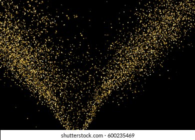 Gold glitter texture isolated on black. Amber particles color. Celebratory background. Golden explosion of confetti 