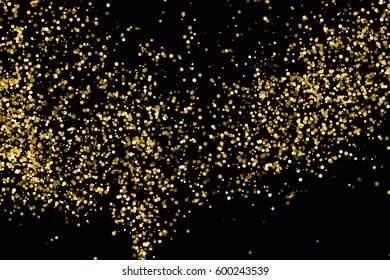 Gold glitter texture isolated on black. Amber particles color. Celebratory background. Golden explosion of confetti. 