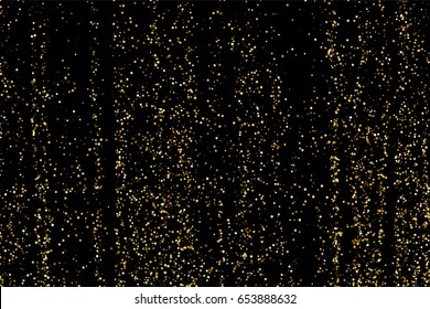 Gold glitter texture isolated on black. Amber particles color. Celebratory background. Golden explosion of confetti.