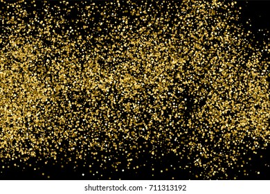 Gold glitter texture isolated on black. Amber particles color. Celebratory background. Golden explosion of confetti.