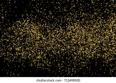 Gold glitter texture isolated on black. Amber particles color. Celebratory background. Golden explosion of confetti.