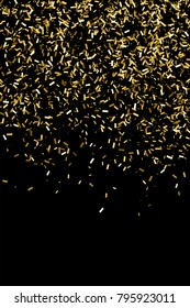 Gold glitter texture isolated on black. Amber particles color. Celebratory background. Golden explosion of confetti.