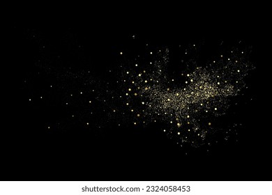 Gold glitter texture on black background. Explosion of golden particles.Festive background. 