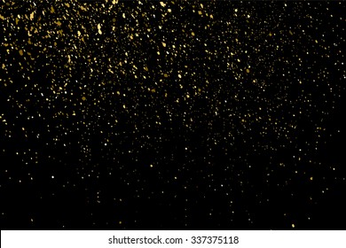 Gold glitter texture on a black background. Holiday background. Golden explosion of confetti. Golden grainy abstract  texture on a black  background. Design element. Vector illustration,eps 10.