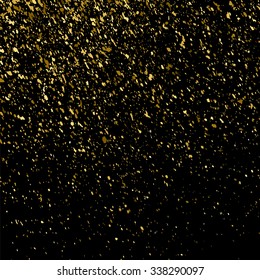 Gold glitter texture on a black background. Golden explosion of confetti. Golden grainy abstract  texture on a black  background. Design element. Vector illustration,eps 10.