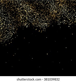 Gold glitter texture on a black background