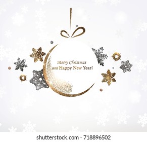 The gold glitter winter holiday border. frame in shape of the Christmas ball for your text with modern snowflakes behind it.