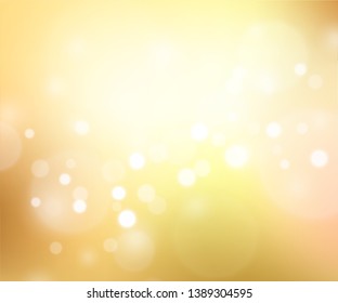 Gold glittering background with bokeh effect. Golden twinkled light backdrop for Wedding or Christmas xmas card