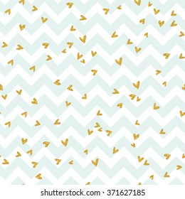 Gold glittering confetti seamless pattern on stripe chevron background
