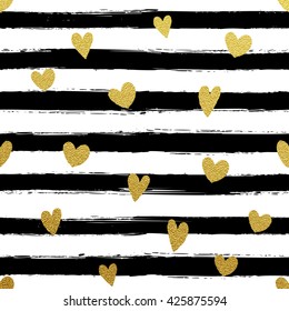 Gold glittering confetti seamless pattern on stripe background