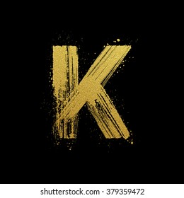 Gold glittering letter K in brush hand painted style