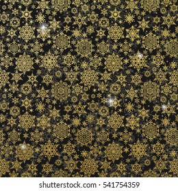 Gold glittering snowflakes pattern on black background. EPS 10 vector file included