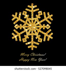 Gold glowing snowflake on a black background
