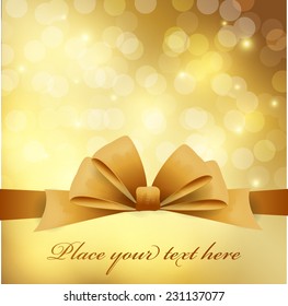 Gold greeting card with bow