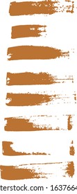 Gold Grunge Brushes Vector Set. Golden Brush Strokes. Hand Paint Original Strokes