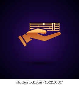Gold Hand holding deck of playing cards icon isolated on dark blue background. Casino gambling.  Vector Illustration