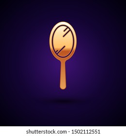 Gold Hand mirror icon isolated on dark blue background.  Vector Illustration