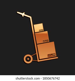 Gold Hand truck and boxes icon isolated on black background. Dolly symbol. Long shadow style. Vector.
