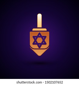 Gold Hanukkah dreidel icon isolated on dark blue background.  Vector Illustration