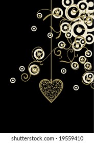 gold heart on black backdrop