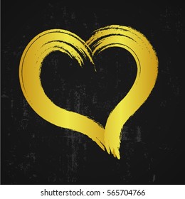 gold heart on black background