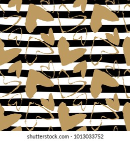 Gold heart seamless pattern on striped background