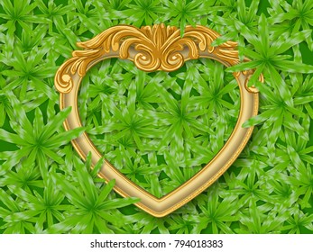 gold heart shape frame on green grass 