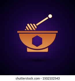 Gold Honey dipper stick and bowl icon isolated on dark blue background. Honey ladle.  Vector Illustration