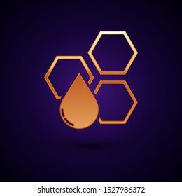 Gold Honeycomb icon isolated on dark blue background. Honey cells symbol. Sweet natural food.  Vector Illustration