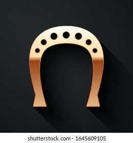 Gold Horseshoe icon isolated on black background. Long shadow style. Vector Illustration