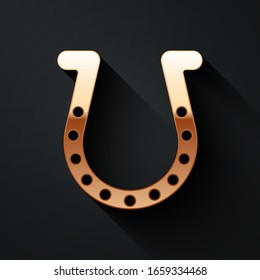 Gold Horseshoe icon isolated on black background. Long shadow style. Vector Illustration