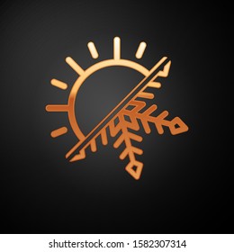 Gold Hot and cold symbol. Sun and snowflake icon isolated on black background. Winter and summer symbol.  Vector Illustration