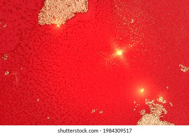 Gold, and hot red abstract alcohol ink marble texture. Vector shining background with natural pattern and glitter. Template for banner, poster design. Fluid art painting