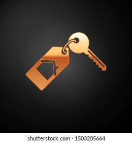 Gold House with key icon isolated on black background. The concept of the house turnkey.  Vector Illustration