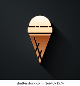 Gold Ice cream in waffle cone icon isolated on black background. Sweet symbol. Long shadow style. Vector Illustration