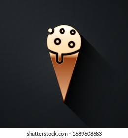 Gold Ice cream in waffle cone icon isolated on black background. Sweet symbol. Long shadow style. Vector Illustration
