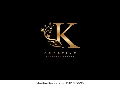 gold initial letter K logo design with beautiful and elegant flower and feather decoration. initial K design. icon K. design K