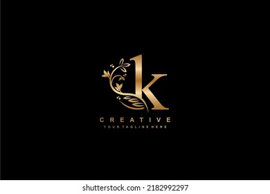 gold initial letter K logo design with beautiful and elegant flower and feather decoration. K design. icon K. design K