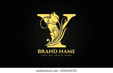 gold initial letter Y logo design with beautiful and elegant flower and feather decoration.