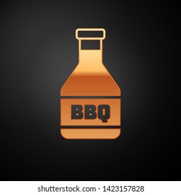 Gold Ketchup bottle icon isolated on black background. Barbecue and BBQ grill symbol. Vector Illustration