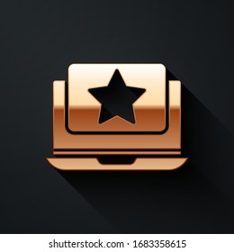 Gold Laptop with star icon isolated on black background. Favorite, best rating, award symbol. Long shadow style. Vector Illustration