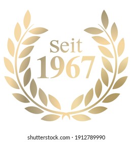 Gold Laurel wreath with German text since 1967 isolated on a white background 