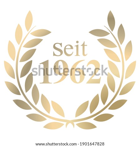 Gold Laurel wreath with German text since 1962 isolated on a white background    
