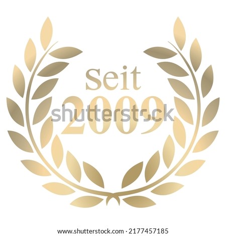 Gold Laurel wreath with German text since 2009 isolated on a white background